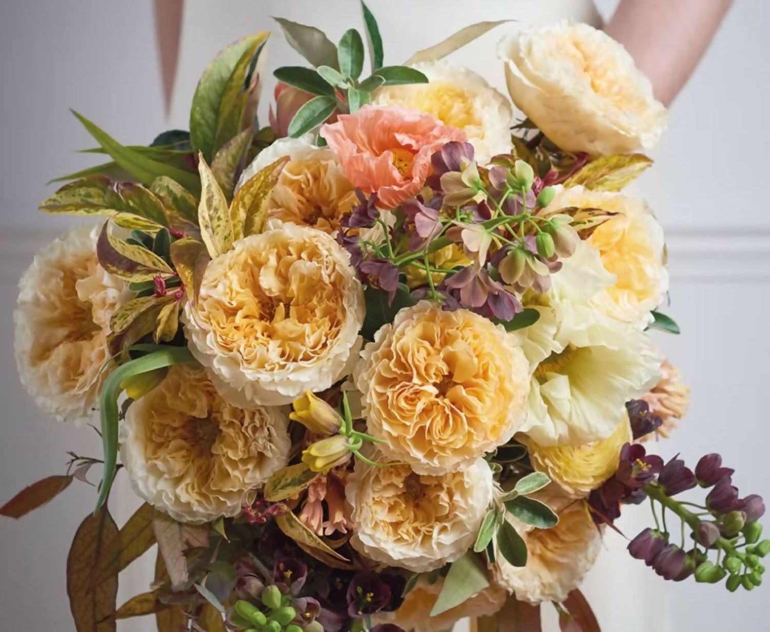 Two hundred mixed garden and spray roses arranged together